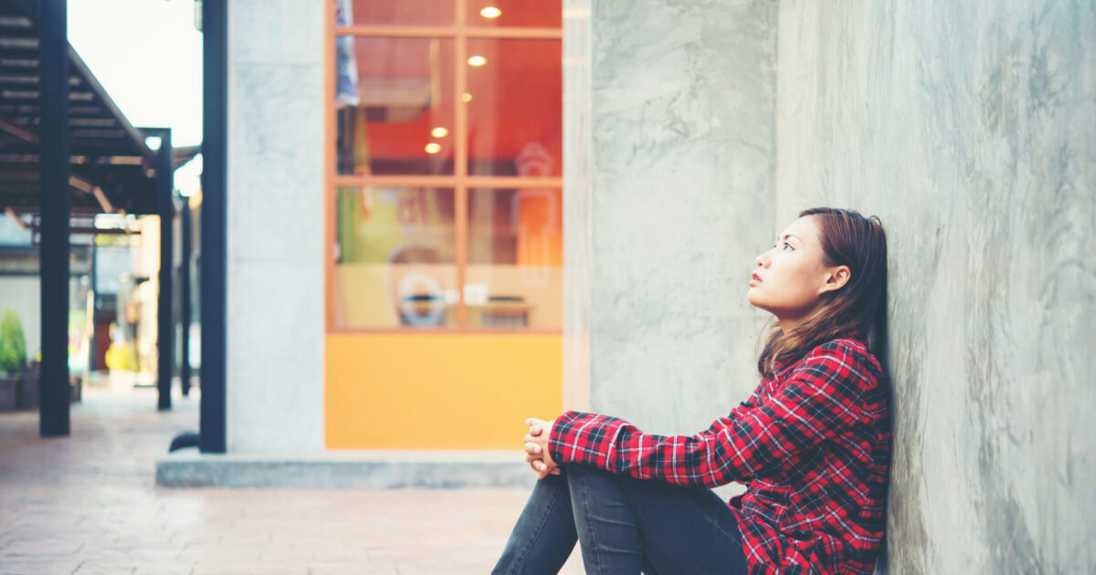 woman sitting outside