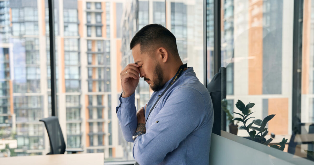 anxious man in an office